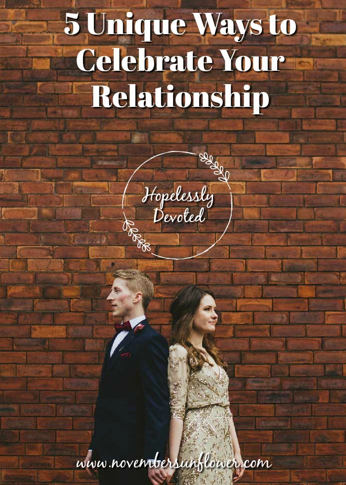 Couple against brick wall - Hopelessly Devoted