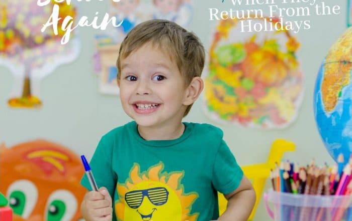 young smiling boy in green t-shirt