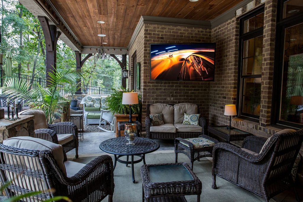 Outdoor Living Space on a porch with an all weather SunBriteTV Veranda Series TV